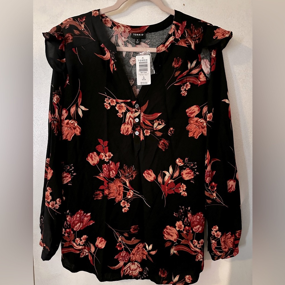 Torrid long sleeve black floral top. Size 2, brand new w/tags, 100% rayon
